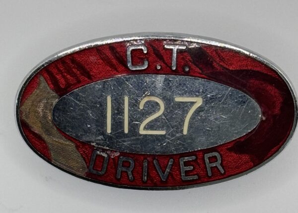 C T Driver 1127 enamel lapel badge.